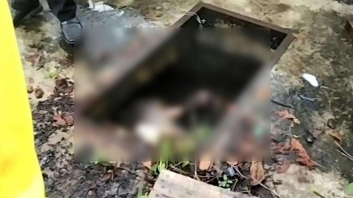 MAYAT PEREMPUAN - Kondisi jasad perempuan ditemukan tewas dalam saluran drainase Depan Gedung Kampus S2 Ilmu Hukum STIHSA Banjarmasin.