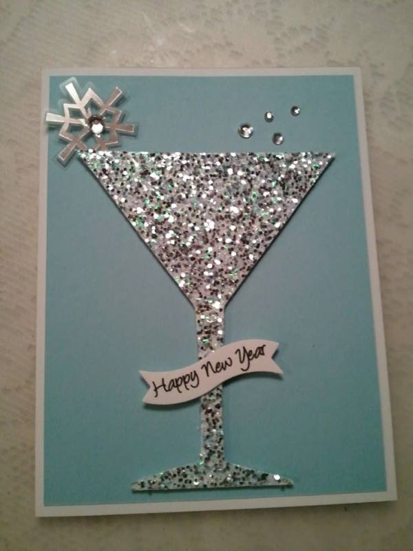 This may contain: a happy new year card with a martini glass