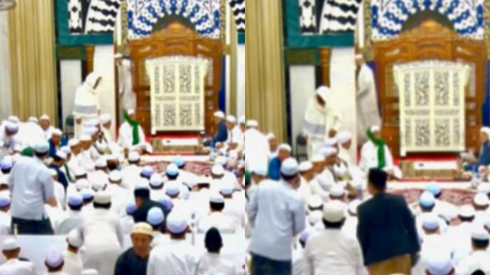 PUTRA MAHKOTA - Keberadaan 2 putra mahkota Guru Sekumpul di balik tirai saat acara puncak momen 5 Rajab di Musholla Arraudah dicapture Minggu, 28 Desember 2025. Terekam ketika Amin Badali dan Ahmad Hafi Badali berjalan keluar meninggalkan mushola melalui pintu sisi kanan mimbar.