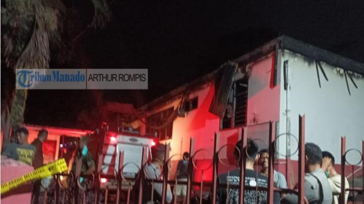KEBAKARAN - Suasana di sekitar Panti Werdha Damai Ranomuut, Kecamatan Paal Dua, Kota Manado, yang terbakar pada Minggu (28/12/2025).