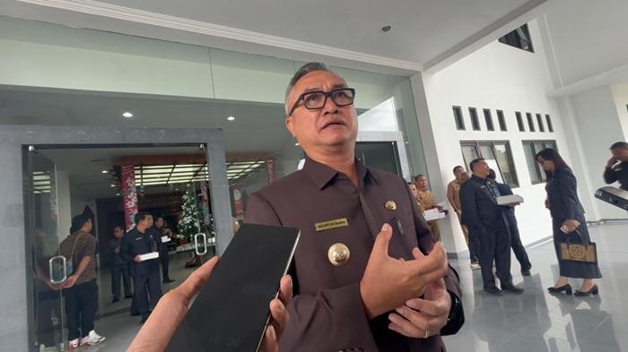 PENETAPAN APBD – Bupati Malinau Wempi W Mawa saat ditemui usai penetapan APBD Kabupaten Malinau Tahun Anggaran 2026, pada Selasa (30/12/2025).(TRIBUNKALTARA.COM / MOHAMMAD SUPRI)