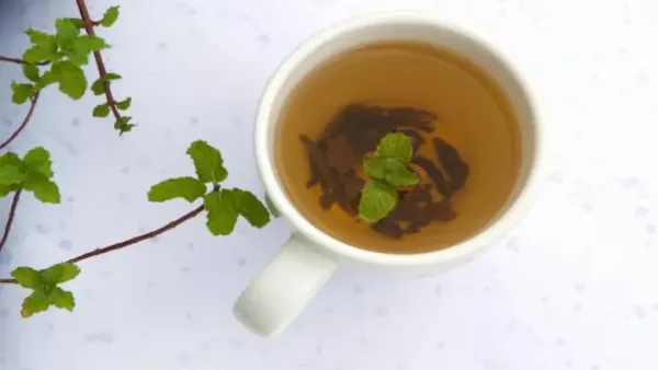 Ginger adds warmth and flavor to green tea.