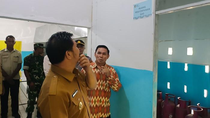 RESMIKAN - Dapur SPPG di Desa Kosio, Kecamatan Dumoga Tengah, Kabupaten Bolmong, Sulut diresmikan, Senin (12/1/2026). Dapur SPPG Kosio ini diresmikan langsung Wakil Bupati Bolmong Dony Lumenta.