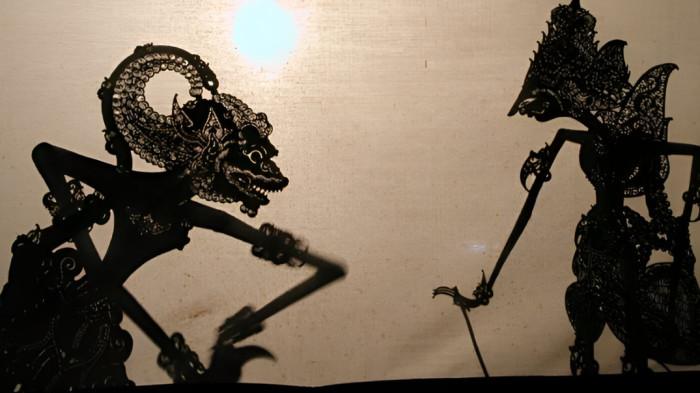 WAYANG KULIT- Ilustrasi pertunjukan kesenian wayang kulit yang merupakan bagian dari tradisi kebudayaan masyarakat Jawa.