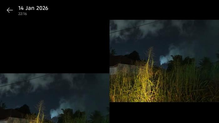 ASAP TEBAL - Aktivitas pabrik di wilayah Desa Kawangkoan, Kalawat, Minahasa Utara (Minut), Sulawesi Utara. Diduga ada pencemaran udara akibat asap tebal yang dihasilkan dari aktivitas produksi pabrik tersebut dan mengakibatkan banyak balita yang terdampak ISPA.