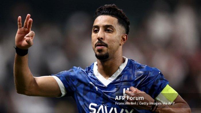 Salem Al Dawsari dari Al Hilal merayakan golnya dalam pertandingan AFC Champions League Elite antara Al Ain dan Al-Hilal di Stadion Hazza bin Zayed pada 21 Oktober 2024 di Al Ain, Uni Emirat Arab. (Foto oleh Francois Nel/Getty Images)