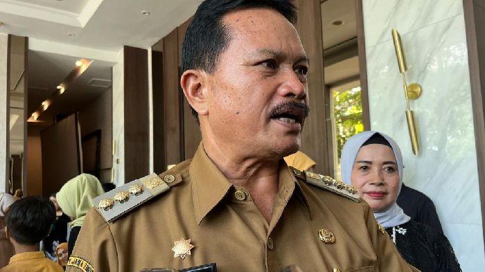 OTT KPK - Wali Kota Madiun, Maidi, ditangkap bersama sejumlah pihak dalam operasi yang berlangsung di Jawa Timur pada Senin (19/1/2026). Wali Kota Madiun Maidi Terjaring OTT KPK Terkait Dugaan Fee Proyek dan Dana CSR (KOMPAS.com/MUHLIS AL ALAWI)