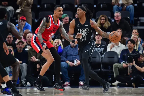 Brooklyn Nets guard Terance Mann (14) moves to the basket against Los Angeles Clippers forward John Collins (20) during the first half at Intuit Dome.