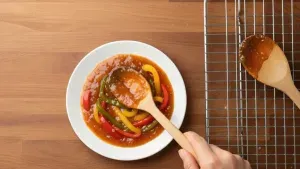 Serving cooked bell peppers in bowl