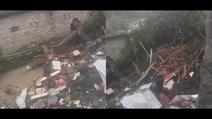 Rumah yang ambruk di belakang sungai yang berlokasi di Banjar Kuwum Ancak, Desa Kuwum, Kabupaten Tabanan pada Rabu 21 Januari 2026. 