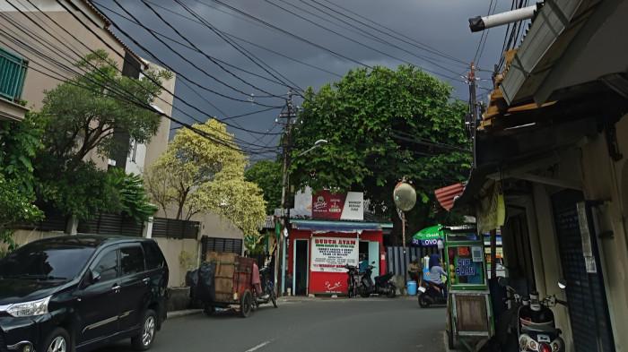 LANGIT GELAP- Ilustrasi sebuah kawasan di Indonesia tampak gelap karena cuaca mendung.