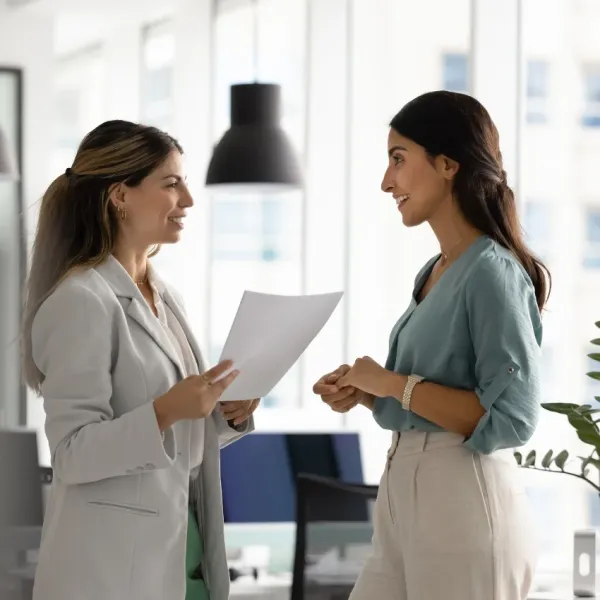 Worker talking to boss about increase in pay CEO says workers lose respect for bosses who won't be transparent