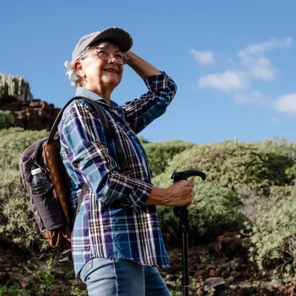 elderly woman lives healthy lifestyle factors into longevity