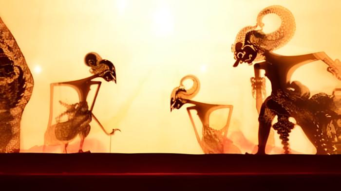 PEMENTASAN WYANG- Ilustrasi pementasan wayang kulit yang merupakan bagian dari tradisi masyarakat Jawa.