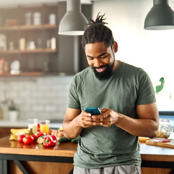 man using phone that has made life better since the 1990s
