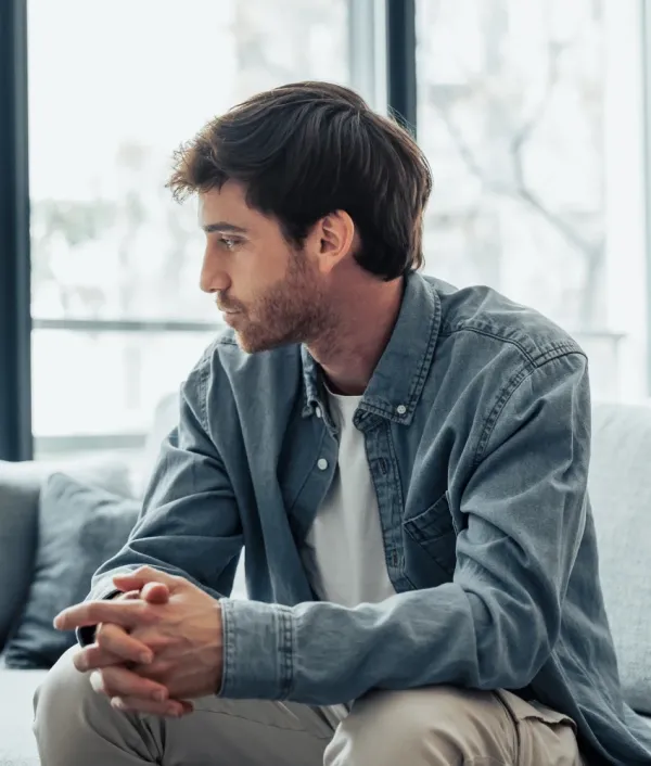 gen z man thoughtful while longing for woman links sacrifice with romance