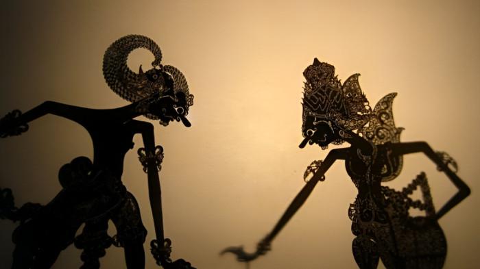 WAYANG KULIT- Ilustrasi pertunjungan kesenian wayang kulit yang merupakan bagian dari tradisi masyarakat Jawa.