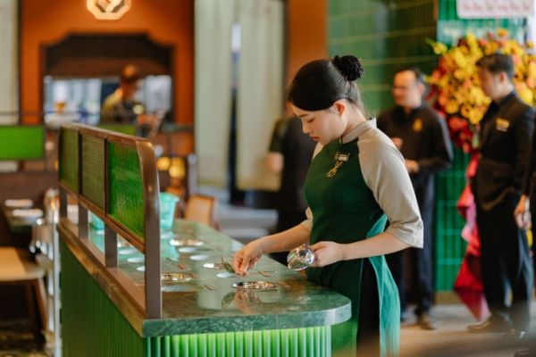 Staff preparing the sauce station at Bac Kim Thang. Photo courtesy of Bac Kim Thang