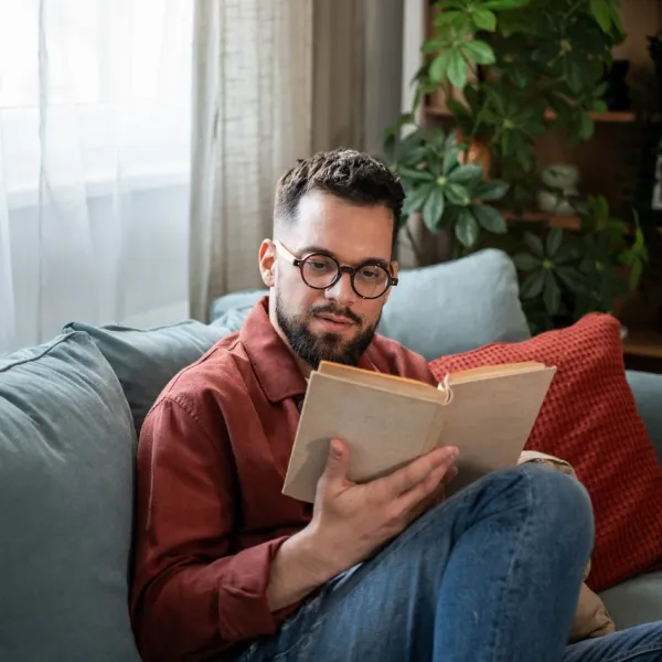 man with the relatable and acceptable hobby of reading