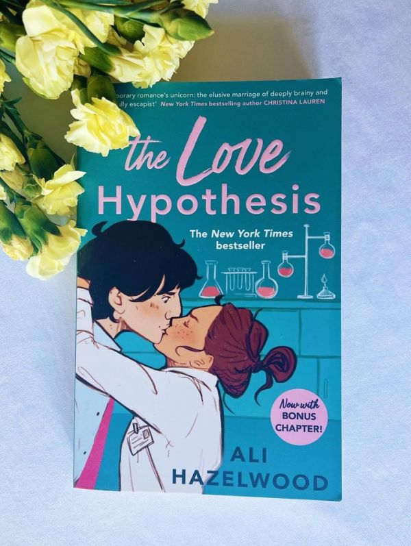 This may contain: the love hypotheiss by ali hazlewood book review and giveaway