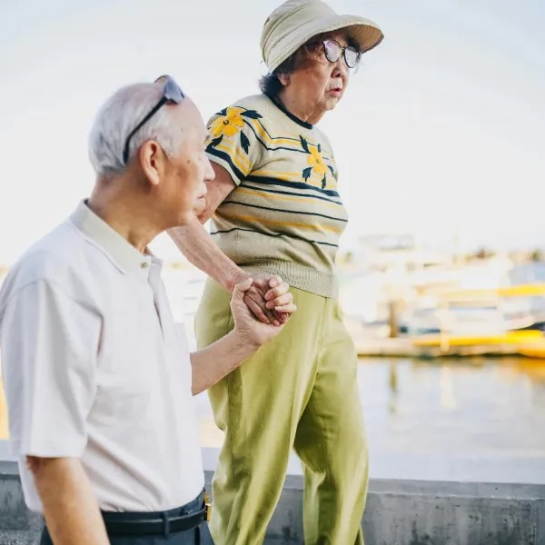 elderly couple that has been married for decades talking