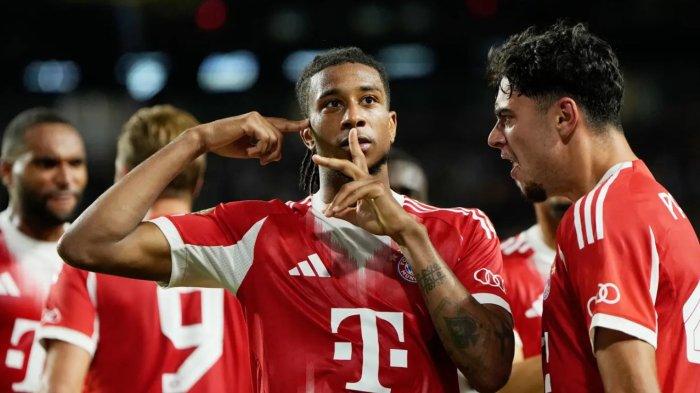 DAFTAR TOP SKOR - Michael Olise melakukan selebrasi setelah mencetak gol melawan Boca Junior di Piala Dunia Antarklub, Sabtu (21/6/2025). Golnya sekaligus meloloskan sang raksasa Jerman ke babak 16 besar, tim kedua setelah Flamengo.