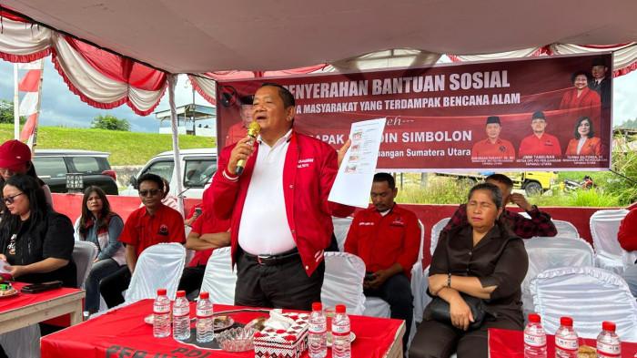 sambutan rapidin saat penyaluran bantuan korban bencana di Tarutung