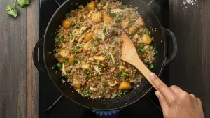 Sabudana khichdi cooking in a pan