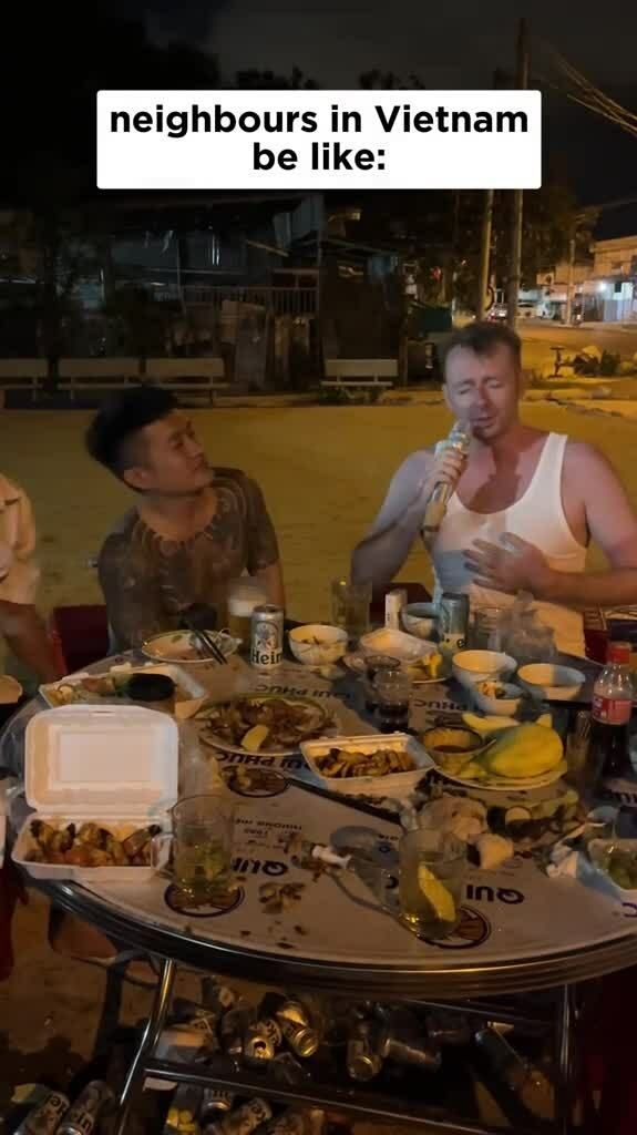 Foreigners learn to 'live together' with Vietnamese neighbors