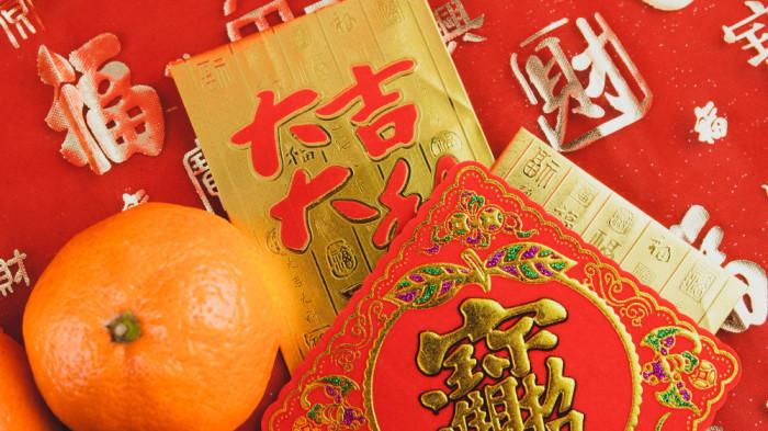 ILUSTRASI RAMALAN SHIO - Foto ilustrasi yang diunduh di Freepik, Rabu (3/12/2025), memperlihatkan angpau.