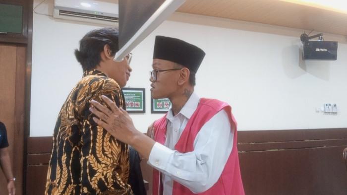 DUPLIK : Perdana Arie saat menjalani sidang agenda duplik di ruang sidang Cakra, Pengadilan Negeri Sleman, Jumat (20/2/2026).
