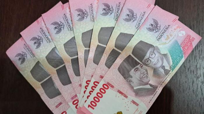 GAJI - Uang pecahan Rp 100.000. Foto ini menjadi ilustrasi untuk artikel tentang THR dan gaji ke-13 PNS 2026