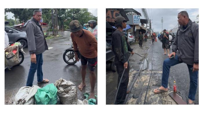 MARAHI PEKERJA GALIAN- Wali Kota Bekasi, Tri Adhianto (Jas Hujan Abu) saat meminta pekerja proyek penggalian kabel optik di Jalan Kali Abang Tengah, Kecamatan Bekasi Utara, pada Minggu (22/2/2026) sore untuk berhenti beroperasi. (DokHumasPemkotBekasi).
