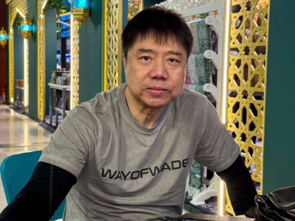 Pelatih ganda putra PBSi, Antonius Budi Ariantho, dalam perjalanan menuju All England Open 2026, Selasa (24/2/2026).