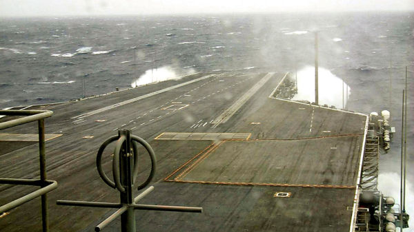 Deck of USS John F. Kennedy during hurricane