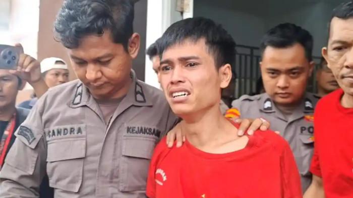 ABK TERANCAM MATI - Terdakwa kasus penyelundupan sabu seberat 2 ton, Fandi Ramadhan menangis usai dituntut hukuman mati, Kamis. Tribunbatam.id/Ucik Suwaibah