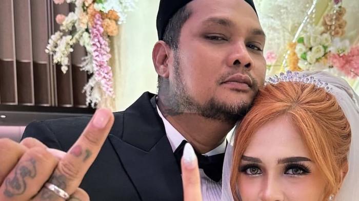 Virgoun dan Lindi Fitriyana pamer cincin dalam unggahan story Instagram usai akad nikah di kawasan Gading Serpong, Kamis (26/2/2026)