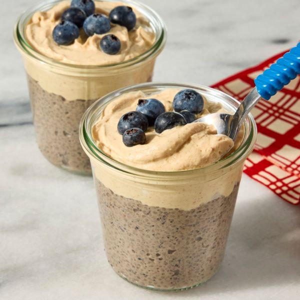 Recipe image of High-Protein Blueberry & Peanut Butter Chia Pudding Credit: Photographer: Jen Causey; Food Stylist: Chelsea Zimmer; Prop Stylist: Claire Spollen.