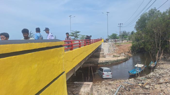 20261003 MOBIL TERJUN2