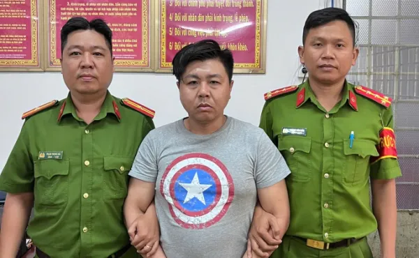 Bui Quang Hieu at the investigation agency. Photo: Ho Chi Minh City Police