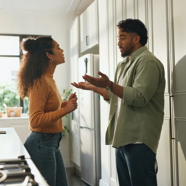 couple fighting in kitchen