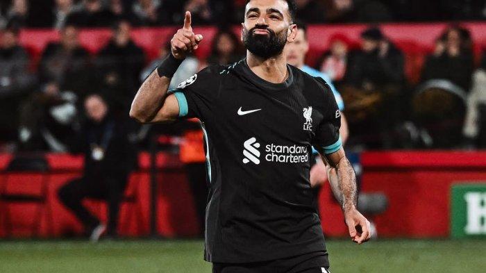 Mohamed Salah usai mencetak gol untuk Liverpool