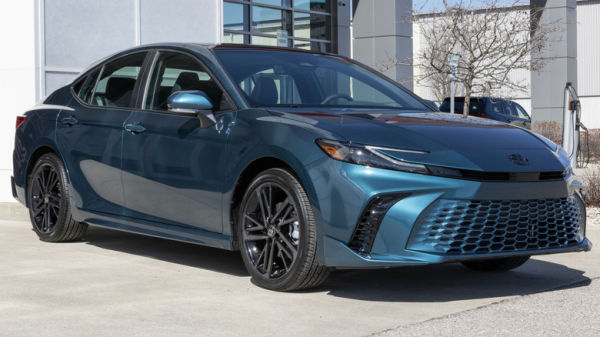 2025 Toyota Camry XSE AWD sedan parked on display