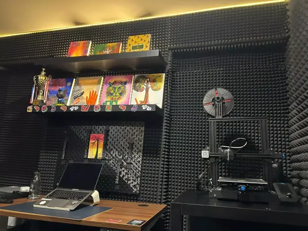 A 3D printer sits above the workstation, allowing residents to prototype and build hardware alongside their software projects. A 3D printer sits above the workstation, allowing residents to prototype and build hardware alongside their software projects.