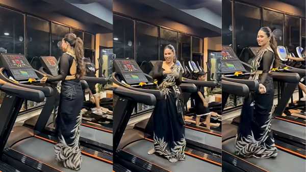 The girl showed her charm in black saree on the treadmill, showed such moves in the gym
