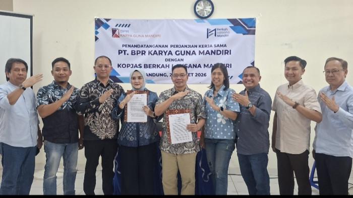 KERJA SAMA - Koperasi Jasa Berkah Laksana Mandiri (Kopjas BLM) dan BPR Karya Guna Mandiri bersinergi melalui kerja sama channeling kredit untuk para pensiunan PNS, TNI dan Polri.
