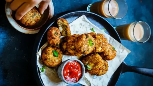 Soya tikki made with ground soybeans, mashed potatoes and spices, pan fried until crisp and golden.