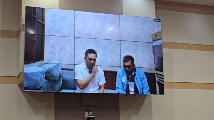 AMSAL SITEPU - Videografer asal Sumatera Utara (Sumut) Amsal Sitepu, hadir secara daring dalam Rapat Dengar Pendapat Umum (RDPU) dengan Komisi III DPR RI pada Senin (30/3/2026). Sambi menangis, dia mengungkap kronologi terkait proyek pembuatan video profil desa yang menyeret dirinya ke dalam kasus dugaan mark up anggaran, pada periode 2020-2022. (Tribunnews.com/ Chaerul Umam)