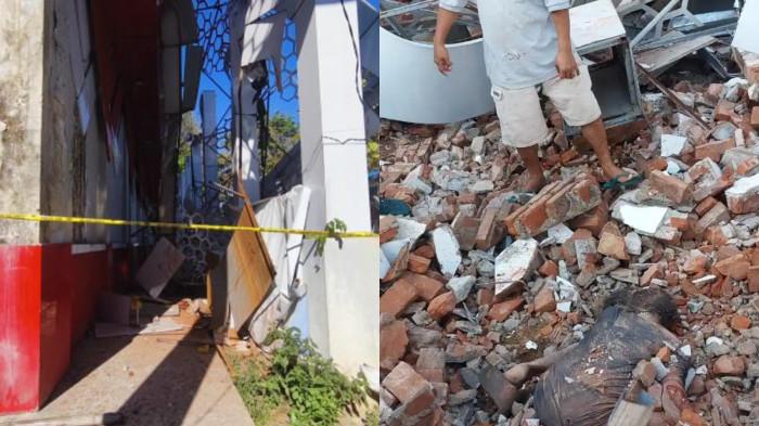 GEMPA MANADO - Warga mengevakuasi korban di lokasi runtuhnya Gedung KONI di Manado setelah gempa bumi magnitudo 7,6 mengguncang wilayah Sulawesi Utara, Kamis (2/4/2026). Gempa tersebut dilaporkan menelan satu korban jiwa dan sempat memicu kepanikan warga.