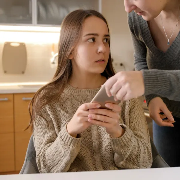 mom taking away teen's phone as punishment